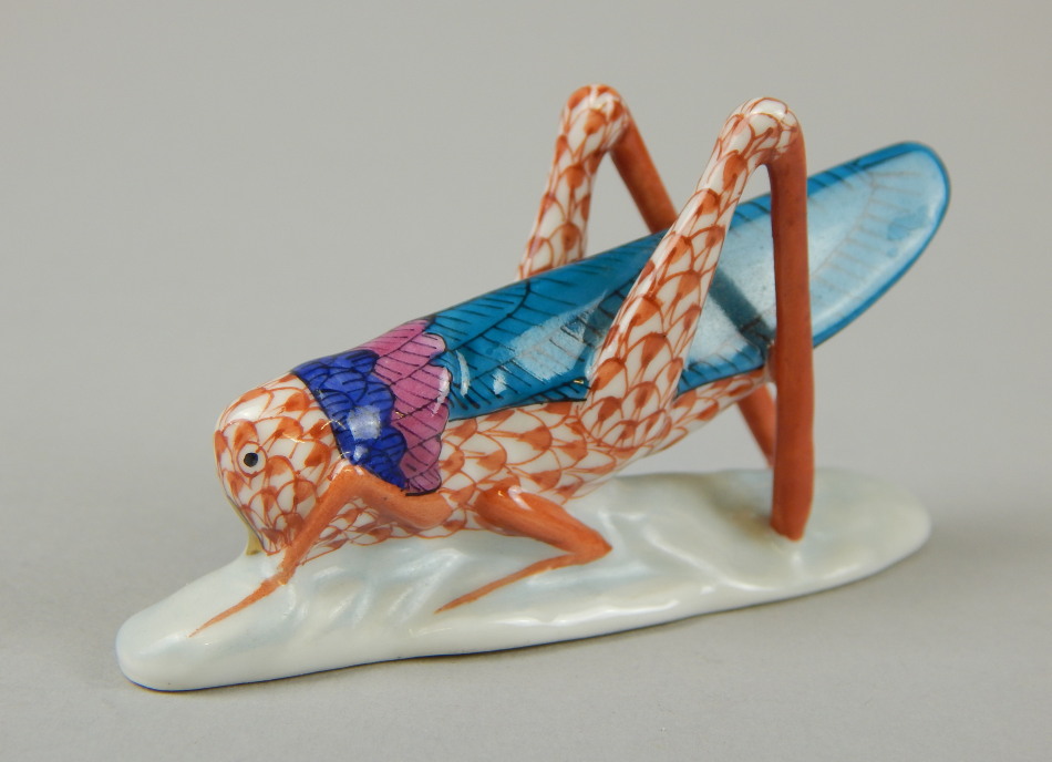 Appraisal: A Herend Hungary figure of a cricket in turquoise pink