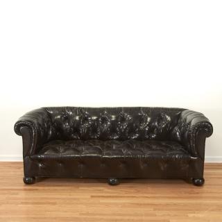 Appraisal: Designer black brown leather chesterfield sofa Designer black brown leather