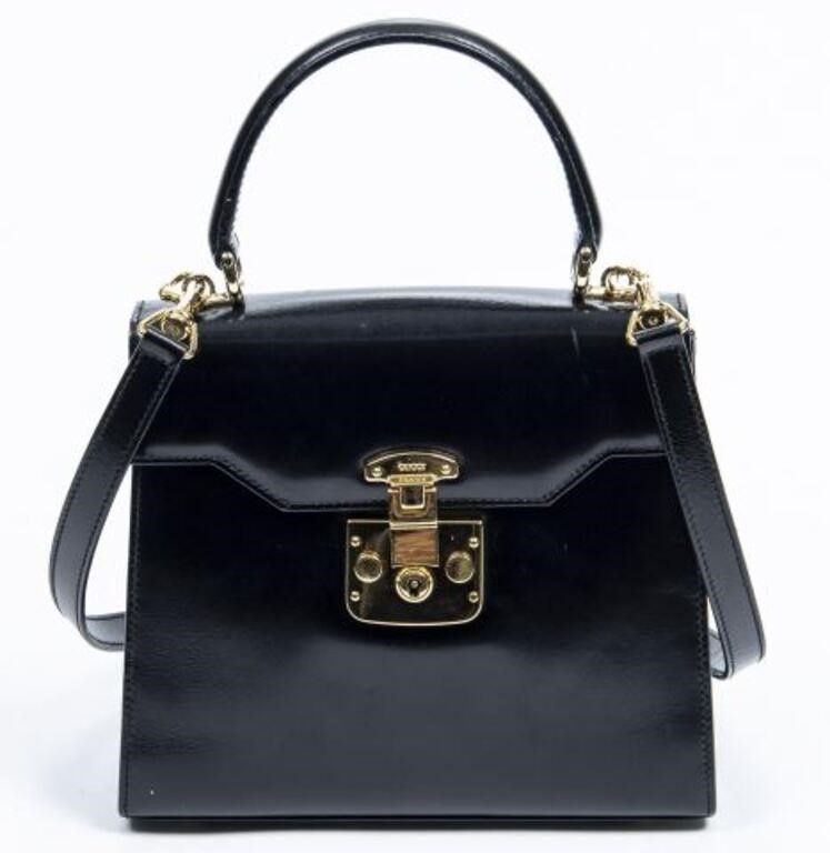 Appraisal: Gucci top handle shoulder bag in smooth black leather with