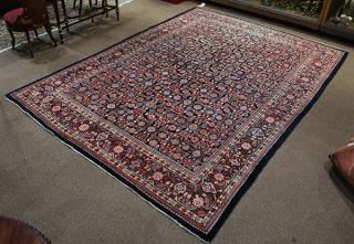 Appraisal: Persian Bidjar rug with overall Herati pattern on a navy