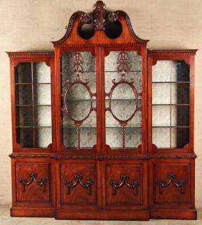 Appraisal: GEORGIAN DESIGNED MAHOGANY BREAKFRONT BOOKCASE HAVING BROKEN ARCH PEDIMENT AND