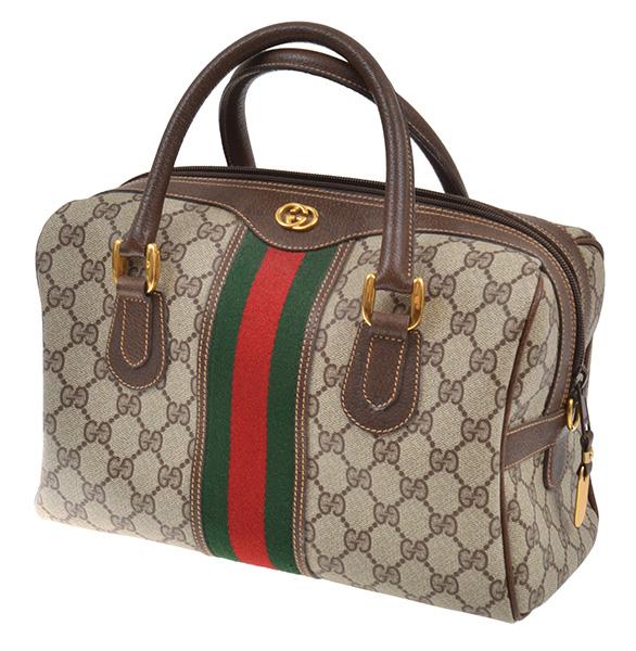 Appraisal: A CLASSIC BAG BY GUCCI BAG Styled in Monogram canvas