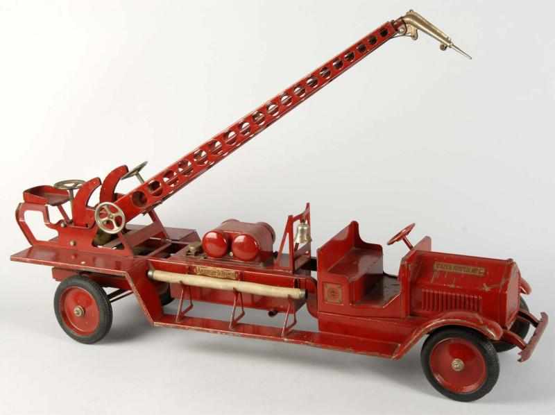 Appraisal: Sturditoy American-LaFrance Water Tower Truck Toy Description American Pressed steel