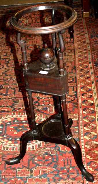 Appraisal: AN TH CENTURY MAHOGANY WASH STAND the top with circular