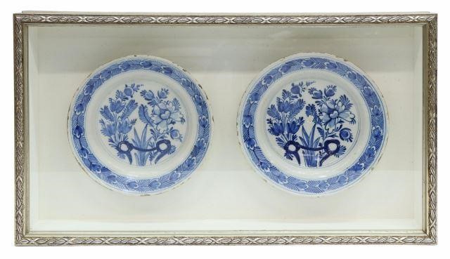 Appraisal: Framed Delft blue and white faience plates two plates decorated