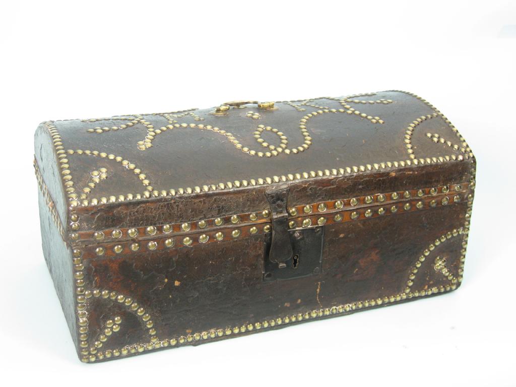 Appraisal: An th century leather covered Love Chest with domed lid