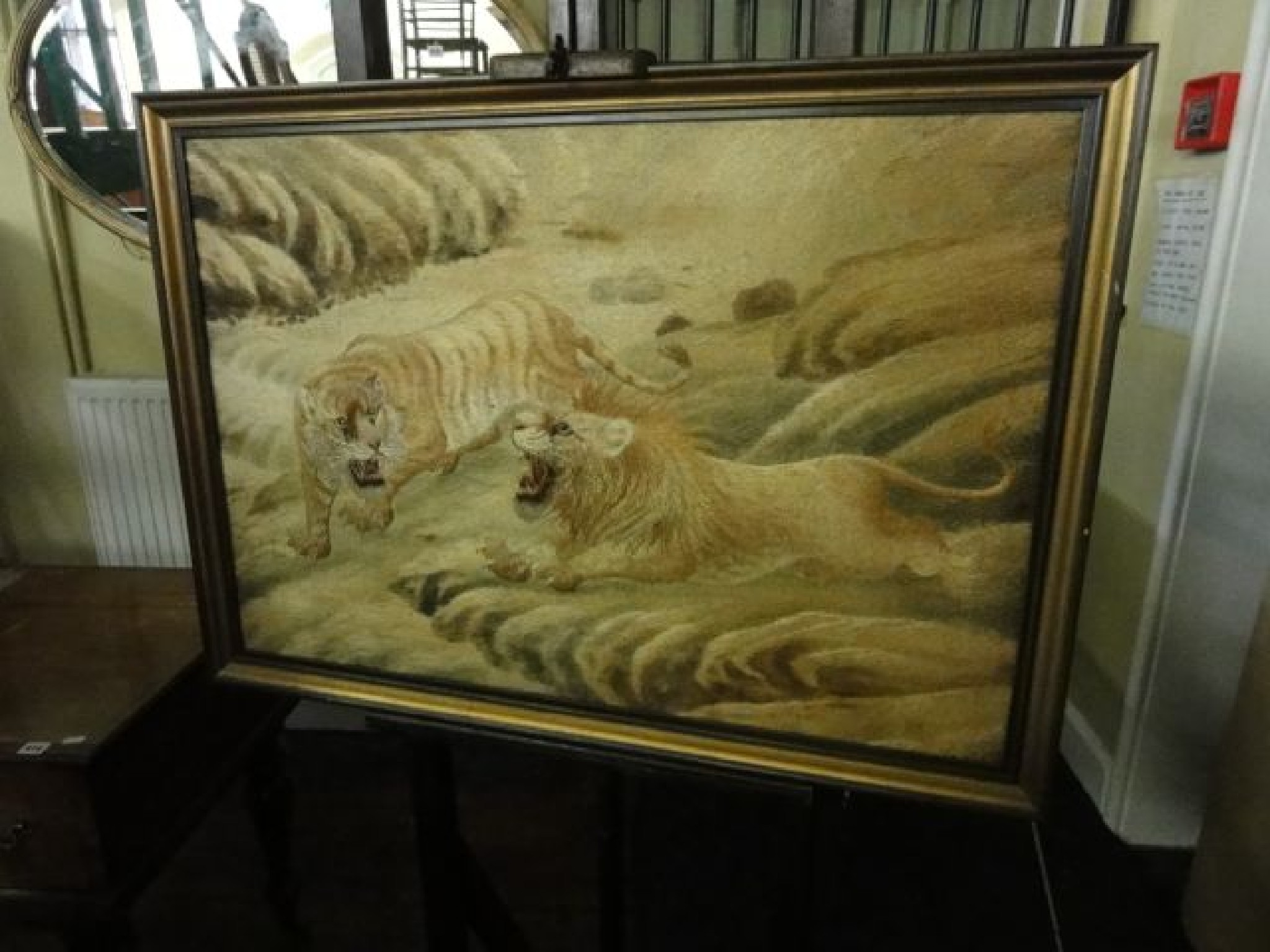 Appraisal: A drawn threadwork picture of a lion and tiger in