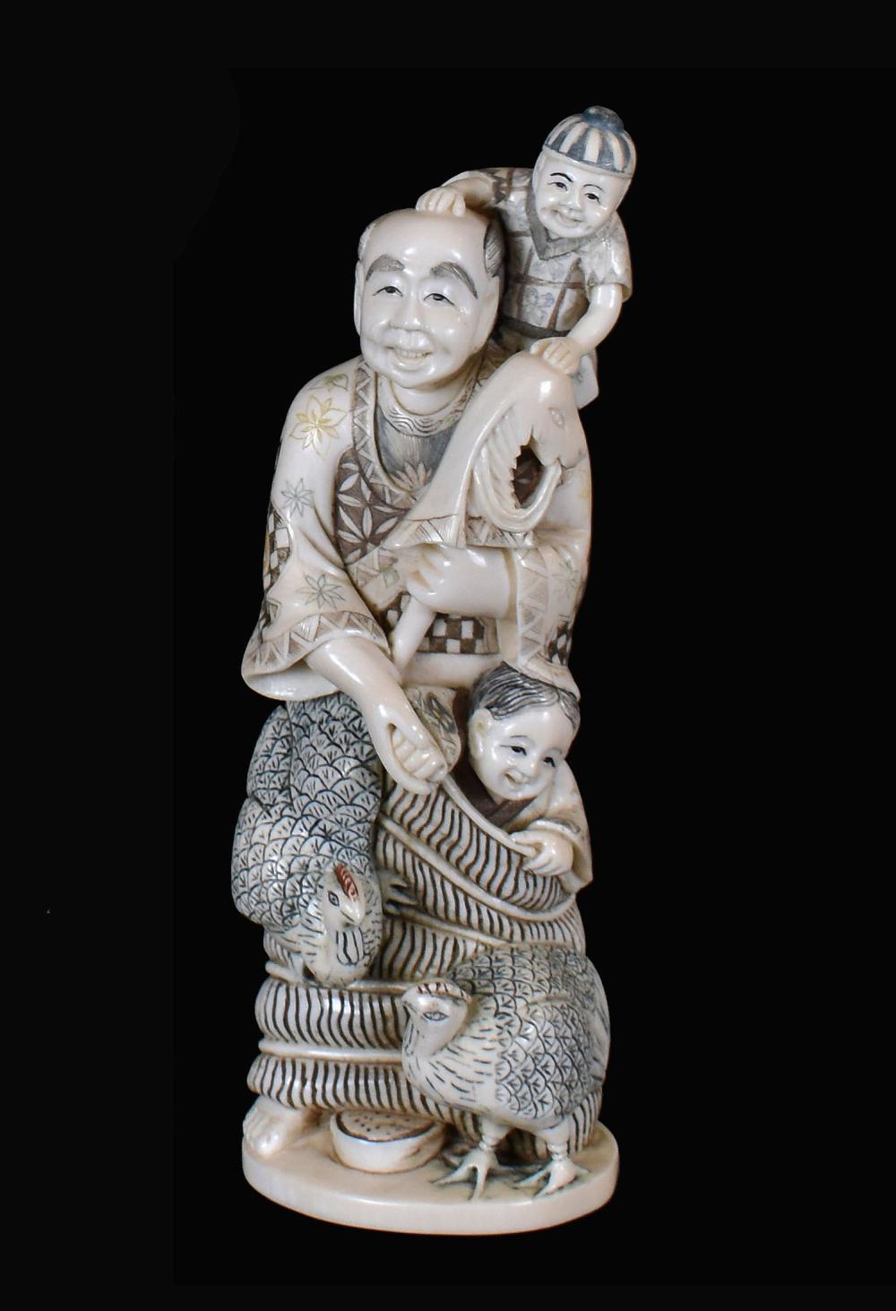 Appraisal: TWO JAPANESE CARVED OKIMONOMeiji Period both signed The first a