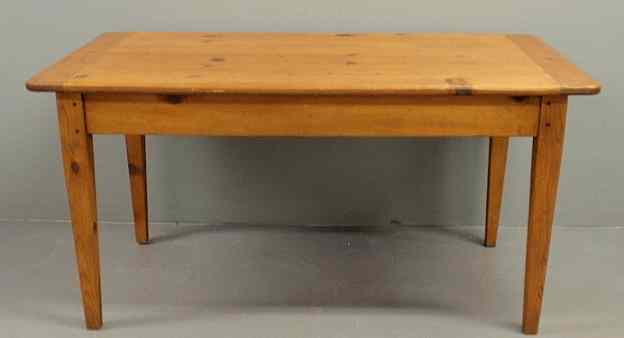 Appraisal: Pine harvest table with breadboard ends and square tapered legs