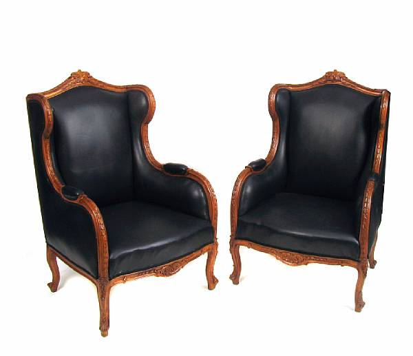 Appraisal: A pair of Louis XVI style leather upholstered bergeres height