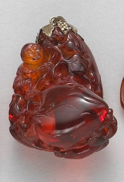 Appraisal: An amber peach branch toggle th Century Of flattened pear