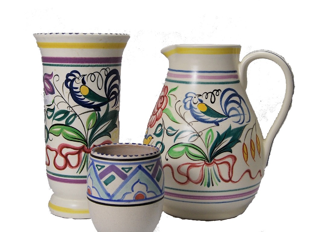 Appraisal: A Poole Pottery floral painted jug with matching vase and