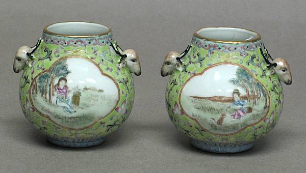 Appraisal: A pair of enameled porcelain miniature hu-form vases Republic Period