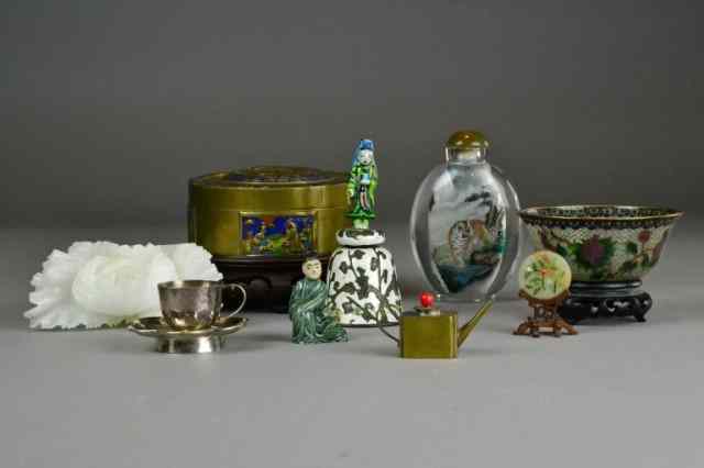 Appraisal: Pcs Chinese Decorative ArtsTo include a Chinese silver cup and