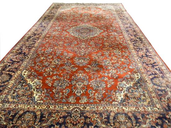 Appraisal: RUG Semi-Antique Persian Sarouk carpet burgandy field minor areas of