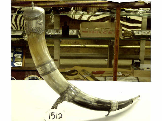 Appraisal: Stylized Viking style horn with hand hammered metal mounts nicely