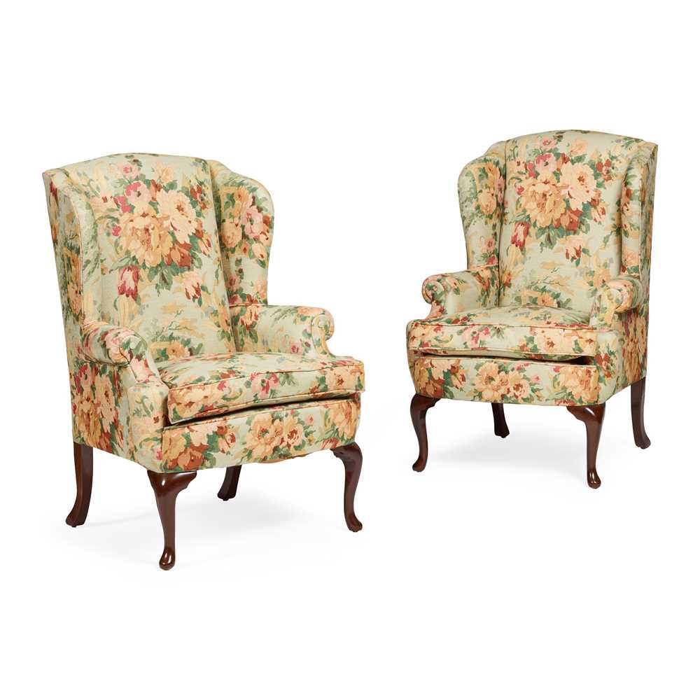 Appraisal: PAIR OF GEORGIAN STYLE WING ARMCHAIRS TH CENTURY with mahogany