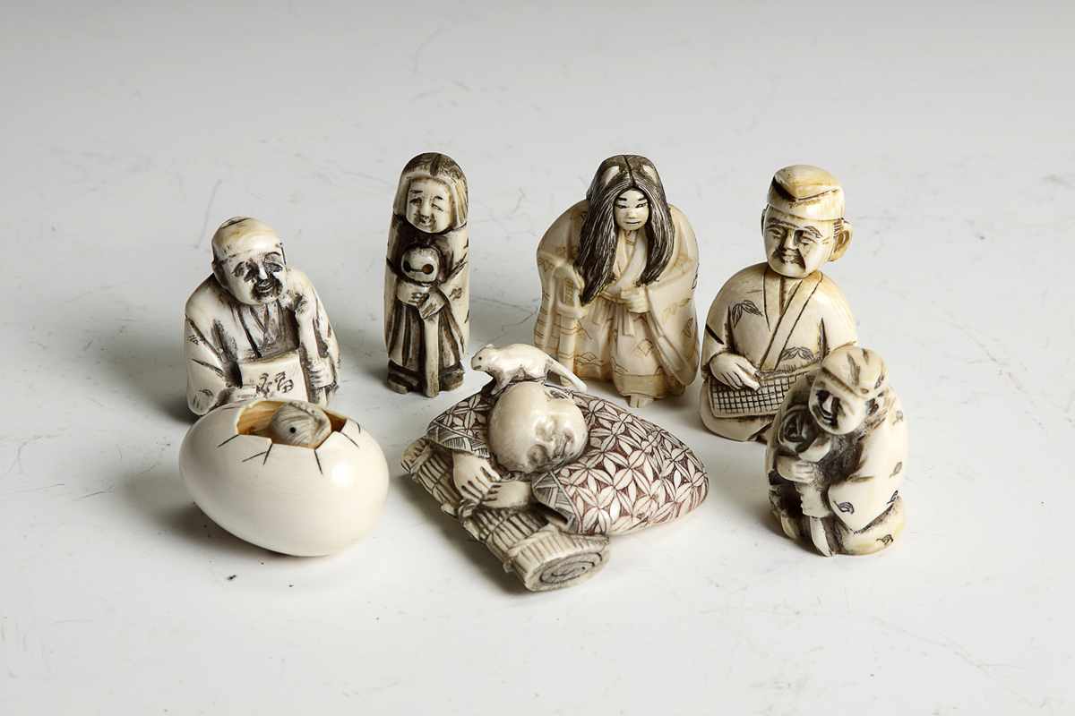 Appraisal: Group of Carved Ivory Netsukes th th cent A few