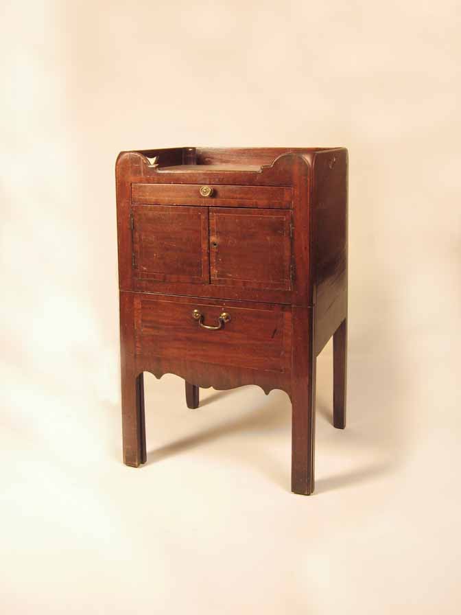 Appraisal: George III mahogany bedside table th th century The three-quarter