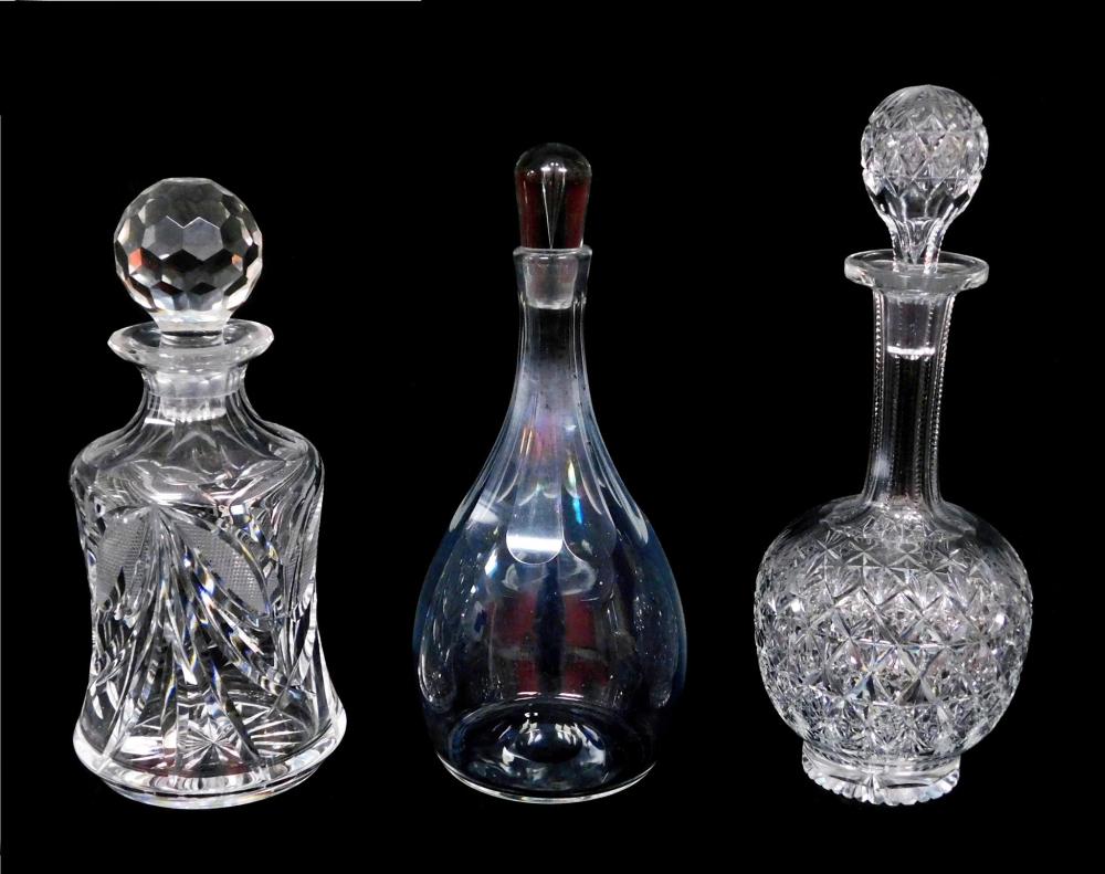 Appraisal: GLASS Three cut crystal decanters one signed Thos Webb England