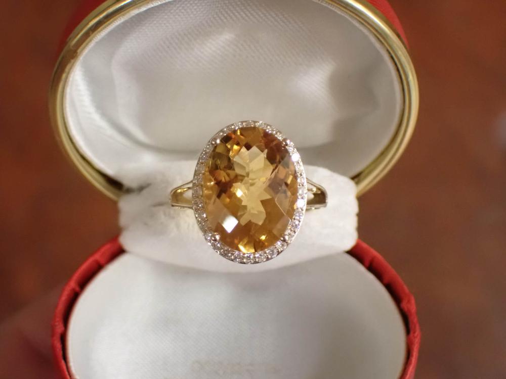 Appraisal: CITRINE DIAMOND AND FOURTEEN KARAT GOLD RING with round-cut diamonds