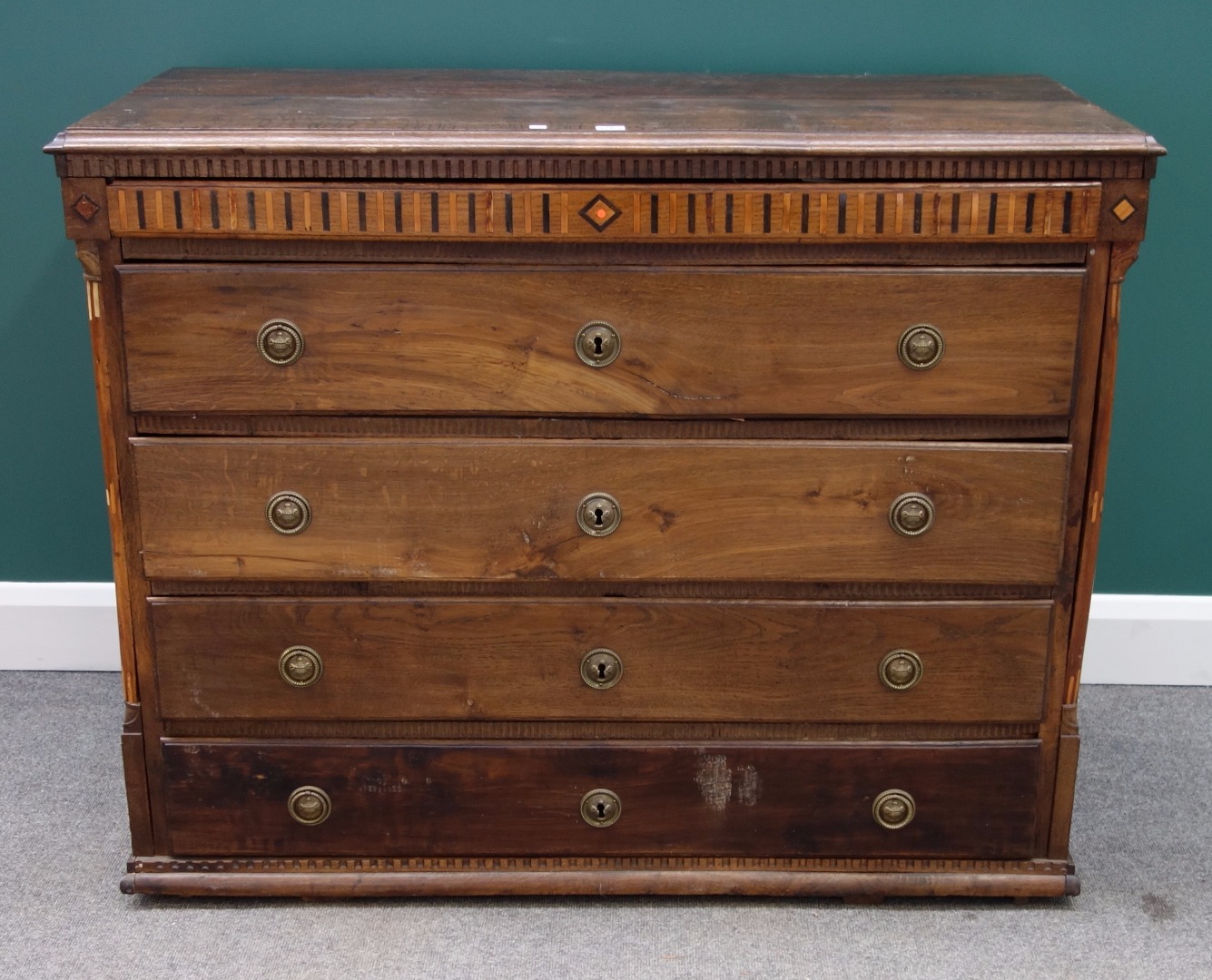 Appraisal: A late th early th century German oak inlaid commode