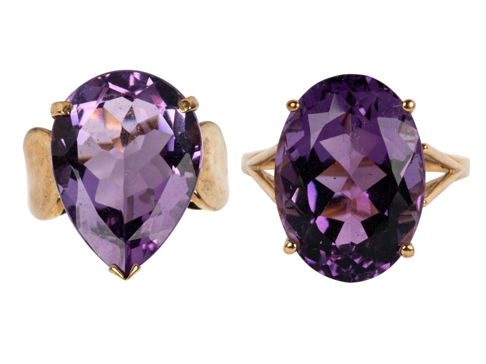 Appraisal: TWO YELLOW GOLD AMETHYST RINGSthe karat yellow gold ring centering