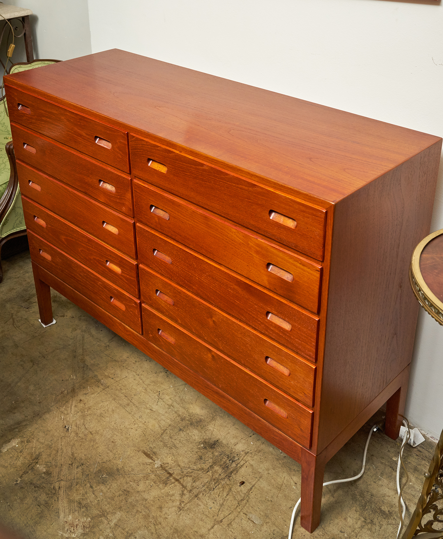 Appraisal: A s DANISH CHEST OF DRAWERS Teak with ten drawers