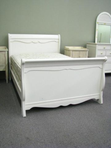 Appraisal: White painted antique style full size sleigh bed with wood