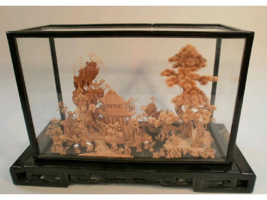 Appraisal: An Oriental carved cork landscape diarama with pagodas trees and