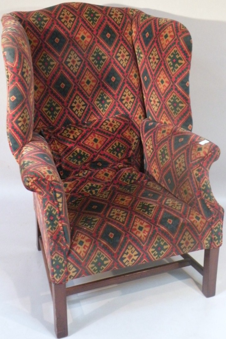 Appraisal: A late thC early thC mahogany framed wing armchair in