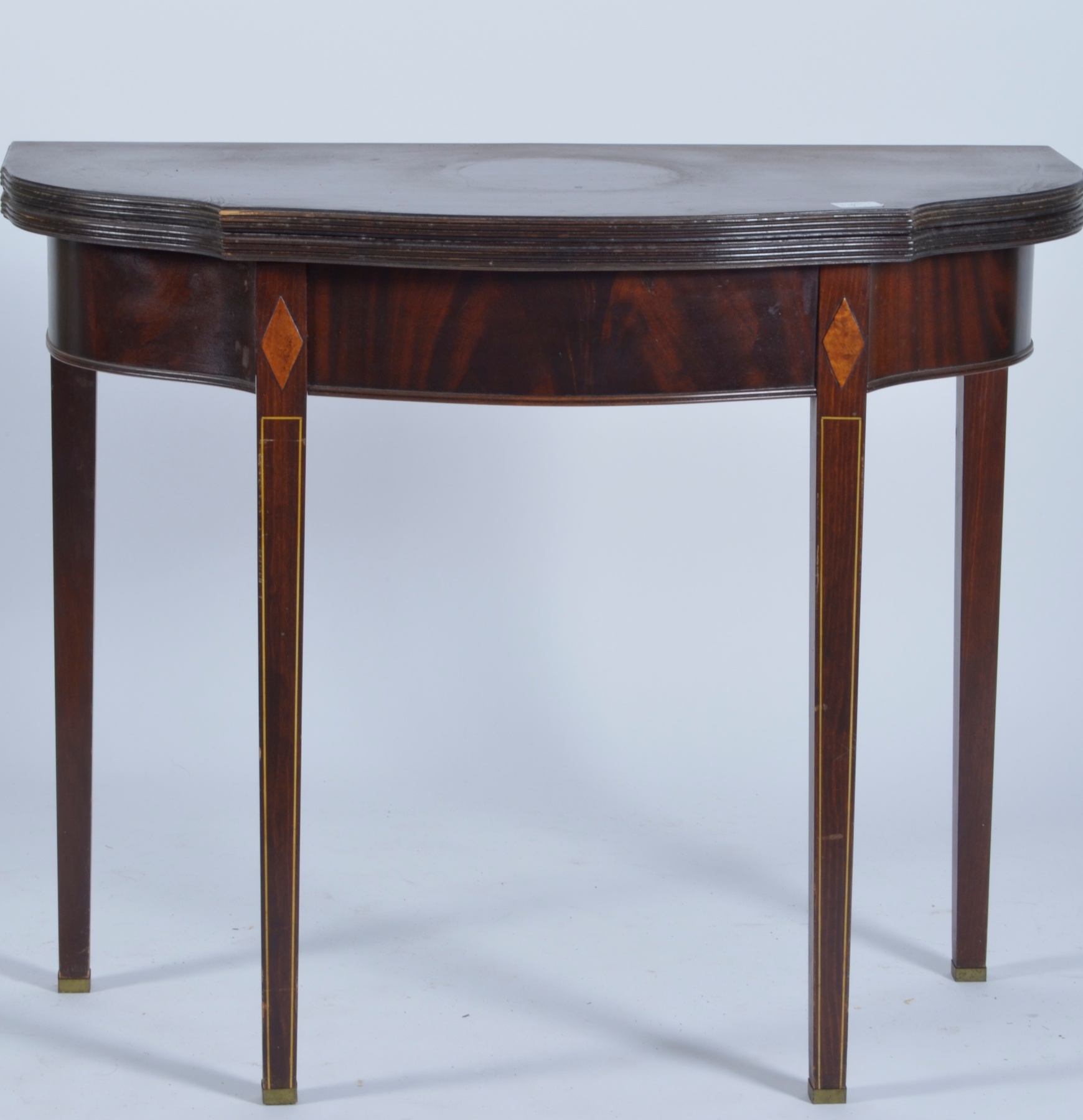 Appraisal: HEPPLEWHITE-STYLE CONSOLE CARD TABLE in mahogany with serpentine front and