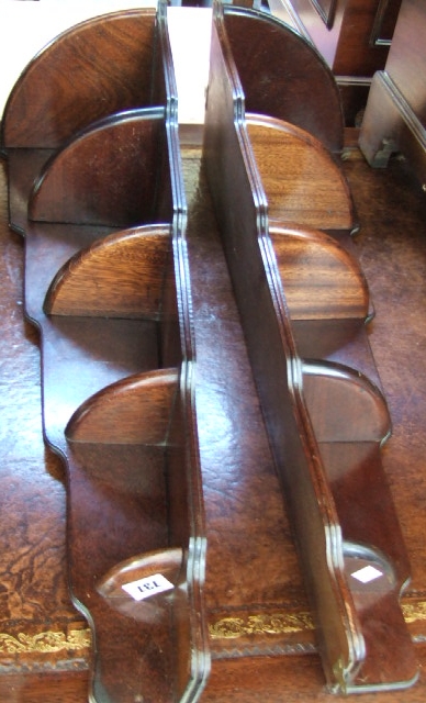 Appraisal: A pair of mahogany graduated corner shelves and a pair