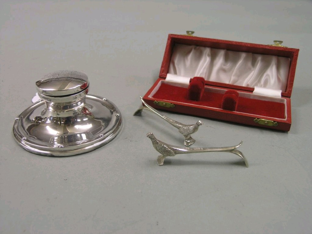 Appraisal: A silver capstan inkwell circular shape with hinged cover Birmingham