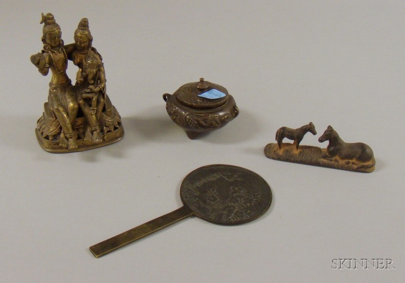 Appraisal: Four Small Bronzes and Metal Figures a cast bronze of