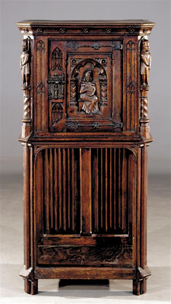 Appraisal: Continental carved oak cabinet on stand early th centuryrectangular case