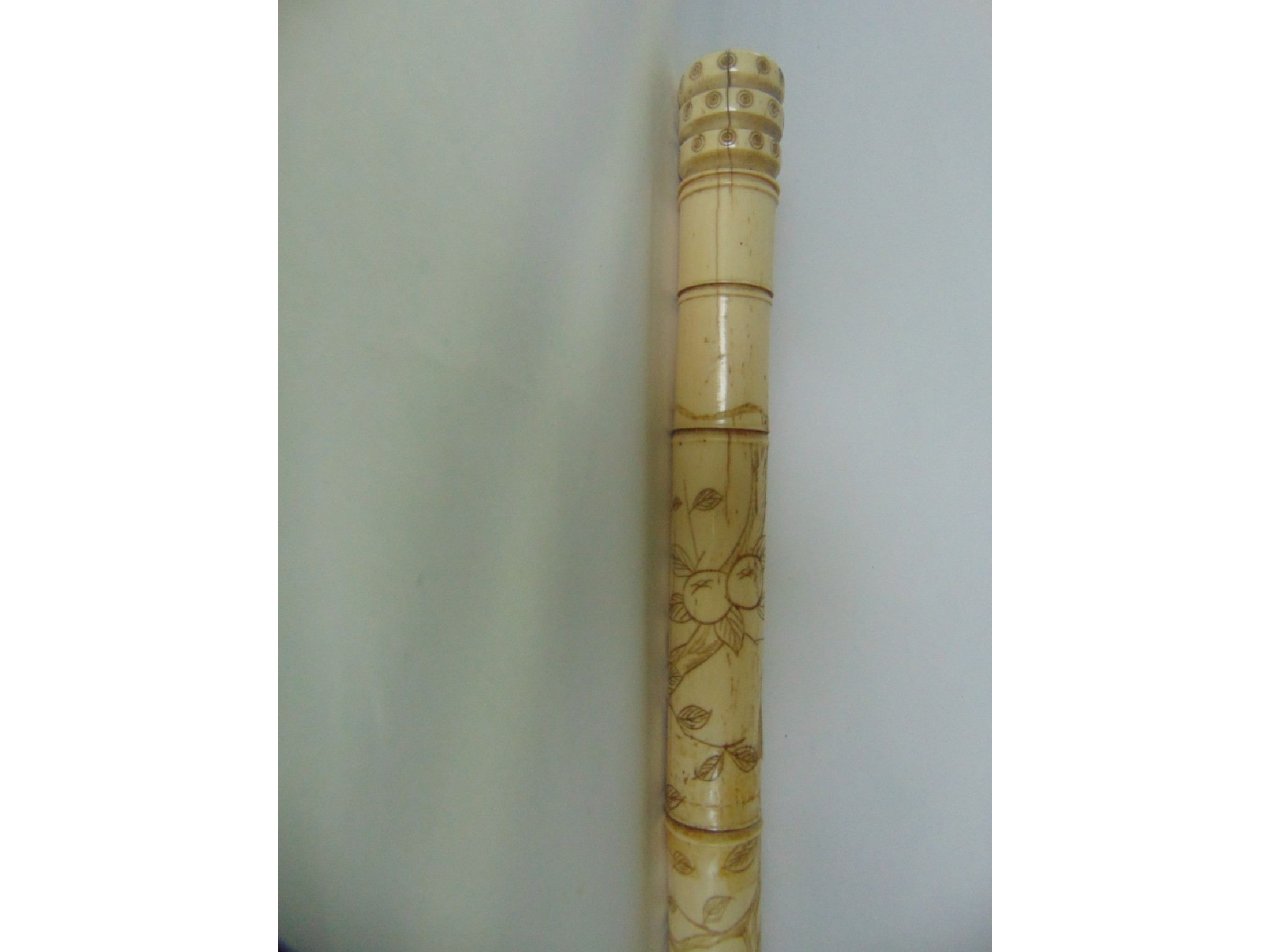 Appraisal: An antique Chinese worked bone walking stick of sectional composition