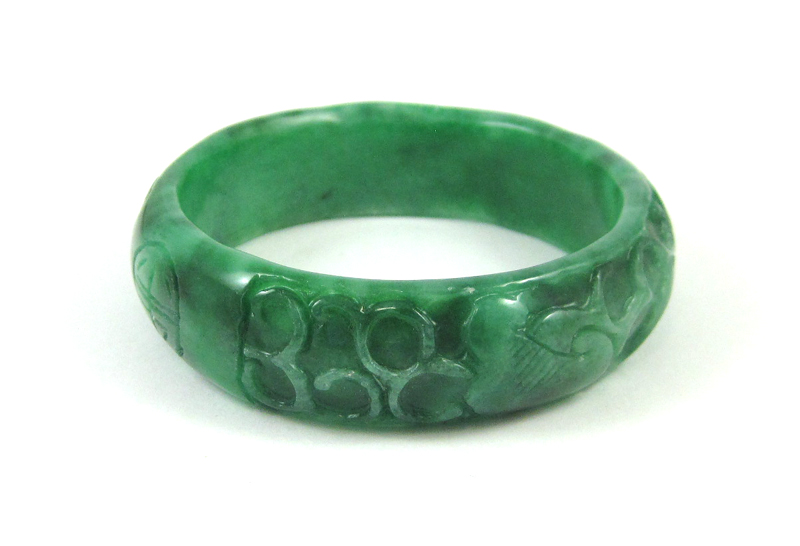 Appraisal: CARVED GREEN JADE BANGLE weighing grams and measuring - inches