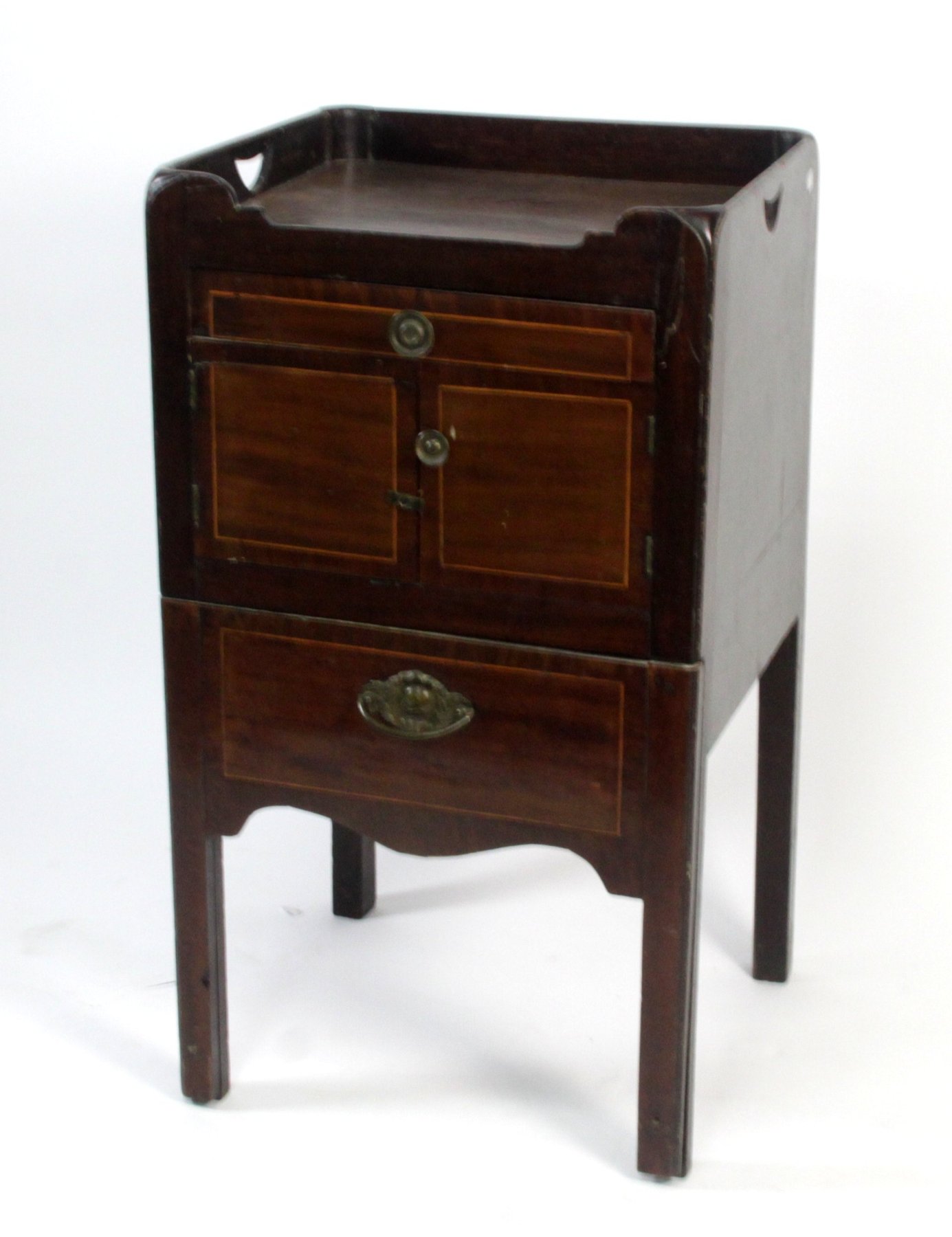 Appraisal: A George III mahogany tray-top commode the galleried top with