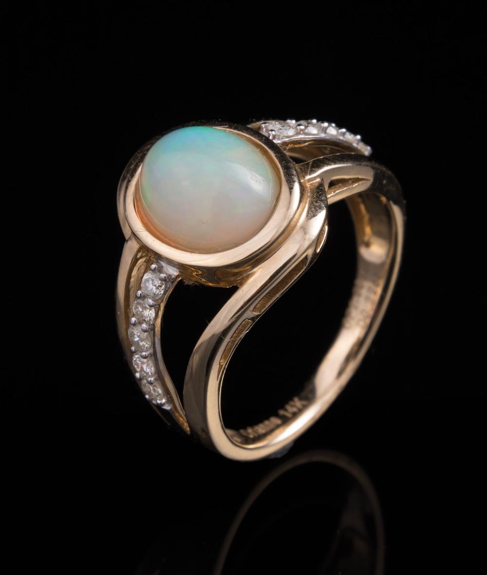 Appraisal: kt Yellow Gold Opal and Diamond Ring center bezel set