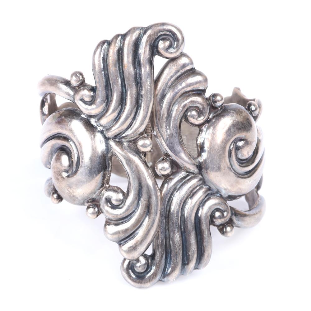 Appraisal: TAXCO MEXICAN MODERNIST STERLING SILVER SWIRLING REPOUSSE CLAMPER CUFF BRACELET