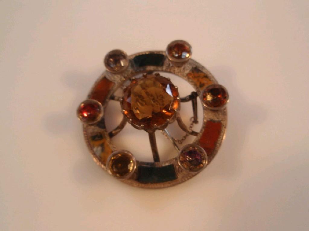 Appraisal: A Scottish silver citrine topaz and agate set circular brooch