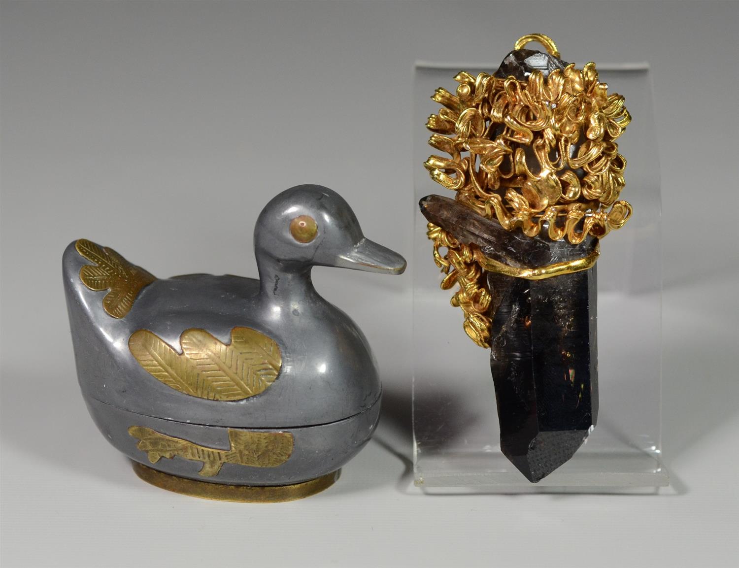 Appraisal: Pieces to include a Chinese pewter and brass duck box