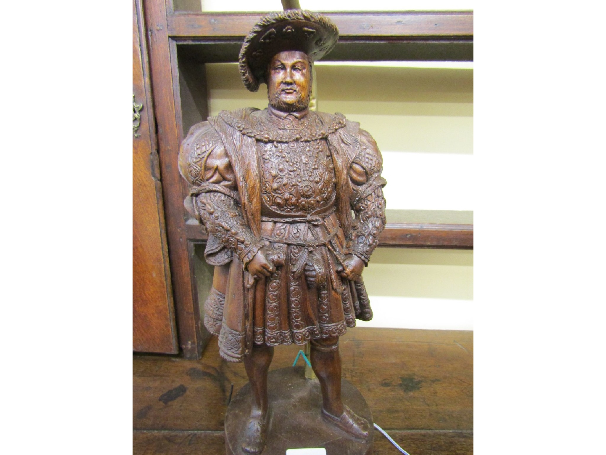 Appraisal: A well detailed carved hardwood figure of Henry VIII in