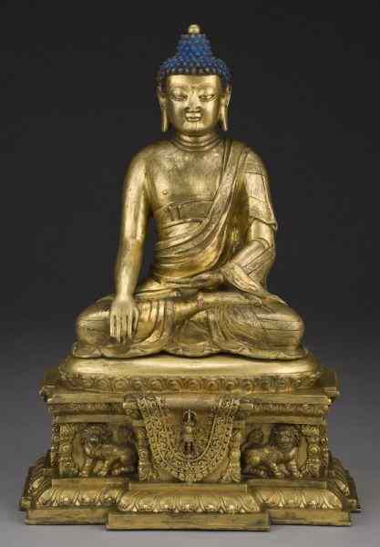 Appraisal: Chinese Qing style gilt bronze Buddha seated on a lotus