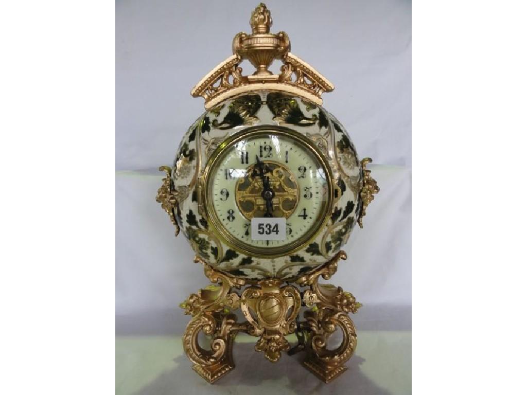 Appraisal: A th century ceramic and gilded mantle clock the eight