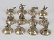 Appraisal: A set of twelve Siamese silver place card holders each