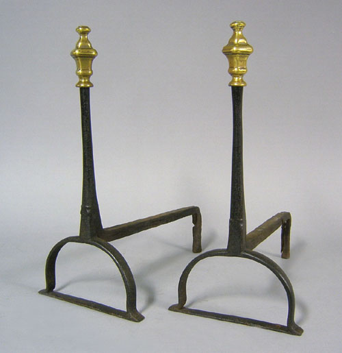 Appraisal: Pair of English wrought iron andirons early th c with