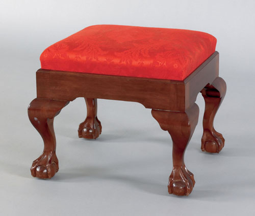 Appraisal: Chippendale style carved mahogany footstool with a rectangular frame and