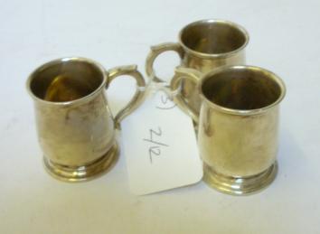 Appraisal: A SET OF THREE MINIATURE MUGS maker Walker Hall Birmingham